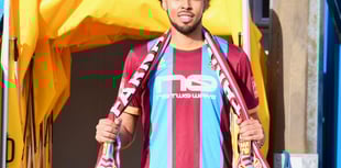 Town sign midfielder from National League South outfit