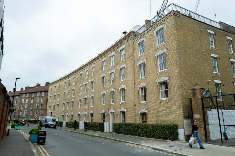 Genera view of  Oval Mansions, whoâs residents have access to the balcony overlooking The Oval cricket ground, London, 3rd June 2025 . A flat overlooking The Oval which boasts some of the finest views in English cricket is up for sale for Â£400,000.The plush properties at Oval Mansions in south London - some of which sell for nearly Â£1m - are the most coveted in the sporting world due to the building's stunning roof terrace.Tenants are able to invite friends up to watch matches, though limitations are sometimes enforced for the highest-profile games. During the Ashes series between England and Australia, spots on the terrace are so highly sought after that plus ones are limited to just one per flat, with management regularly having to eject those who manage to sneak in. 

