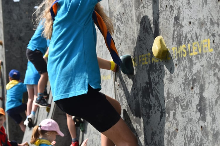 Haslemere Rainbows take on the climbing wall at Bazzaz