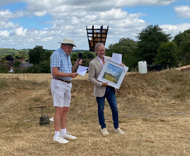 High praise as benefactor gifts hill to village