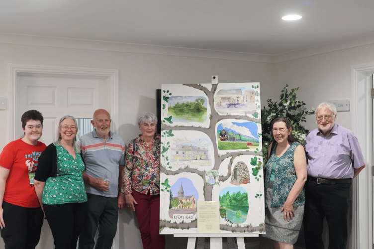 Artists from Alton Art Society painted a picture depicting scenes of Alton for Hartford Care's Alton Place home, June 26th 2025.