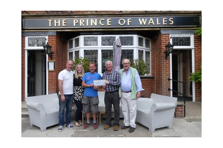 (pictured left to right) Nick Sam, landlord of the Prince of Wales; partner and landlady Becky Chevis; Nathan Tough, event organiser and Ground Covered owner; Dr Mark Hurst, retired Haslemere GP and League of Friends president; and Martin Coakley, retired solicitor and League of Friends committee member