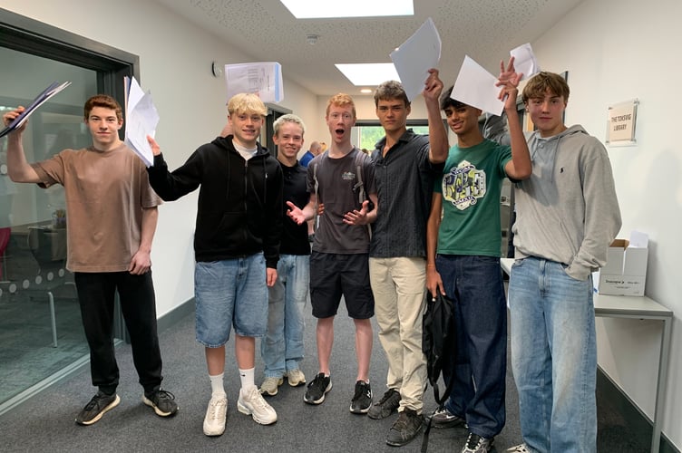 Students from Woolmer Hill celebrate their outstanding GCSE results