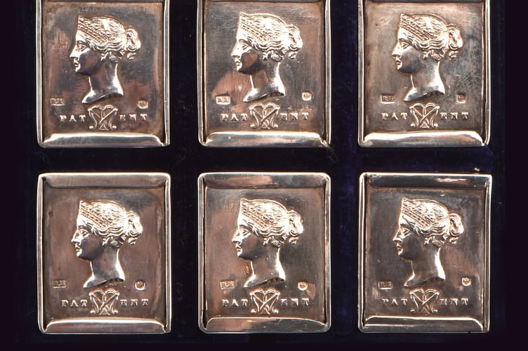 A rare cased set of nine Victorian silver MacNeills patent stamp applicator.