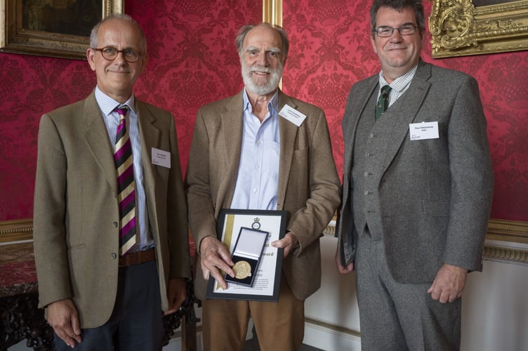 Michael Cowdray from Cowdray Estate (centre) receives Bledisloe Gold Medal from RASE