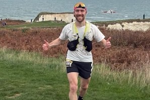 Tom Owen nearing the finish line of the Jurassic Coastal 24km race
