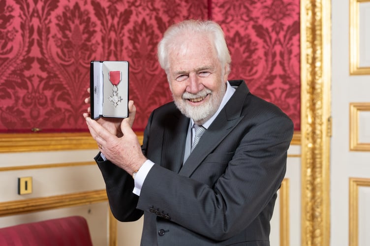 Proud moment: “Community Ken” shows off his MBE after being honoured for his tireless dedication to Haslemere and its many community projects.