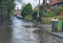 Drivers battle through the ‘Bramshott Sea’ on Church Road