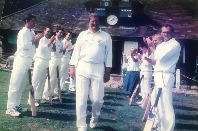 Chic Stedman receives a guard of honour on his last match for Farnham Cricket Club