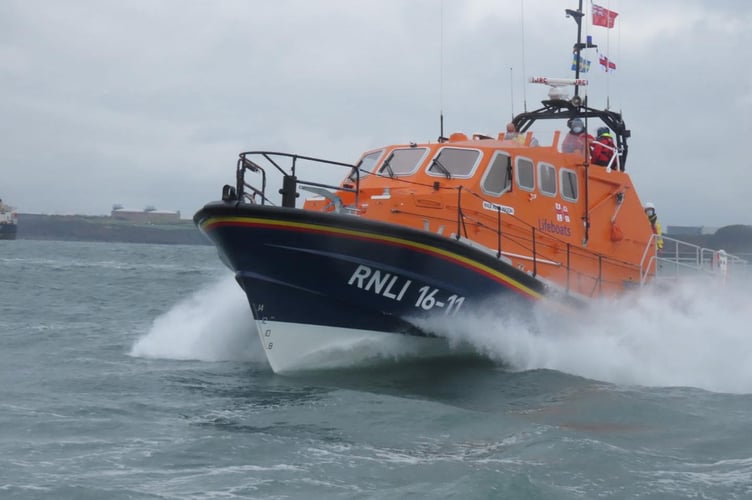 Angle RNLI crew members raced to the rescue of a 28ft yacht in difficulty in 42 knot winds and seas reaching 6 metres.