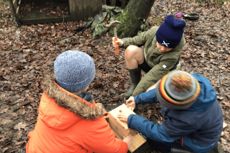 Year 6 pupils assembling bird boxes with The Lynchmere Society. Photo: Camelsdale School