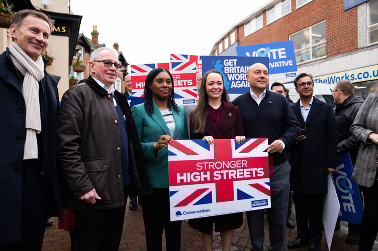 Tory Leader Kemi Badenoch with business owners on Godalming High Street.