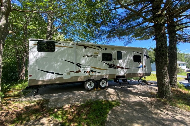 A British couple sold their troubled new-build home and moved to rural Canada to build their dream house mortgage-free after snapping up seven acres of land for just £30,000. llChris and Sarah Kennealy, both 41, left Basingstoke, Hampshire, in August 2023 after growing fed up with the cost and frustrations of home ownership in the UK.  The pair, who married in October 2018, had spent four years in their new-build property but say constant issues with the house left them disappointed. 