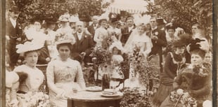 Can you help uncover the story behind this old wedding photo?