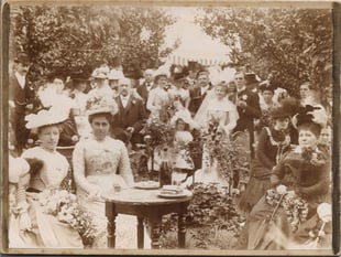 Can you help uncover the story behind this old wedding photo?