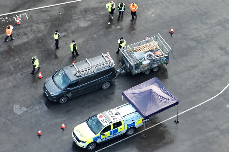 Phoenix drone shot of a Surrey Police vehicle check.