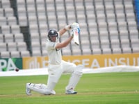 Smith and Lawrence save Surrey from defeat
