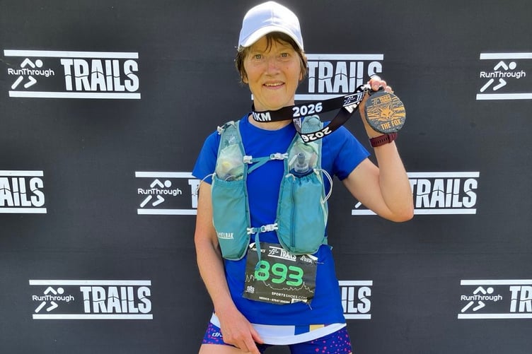 Philomel Bennett show off her Fox 41km medal