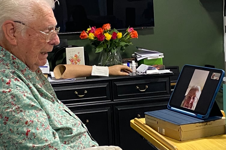 Rodney Anderson chatting online with his Canadian family.