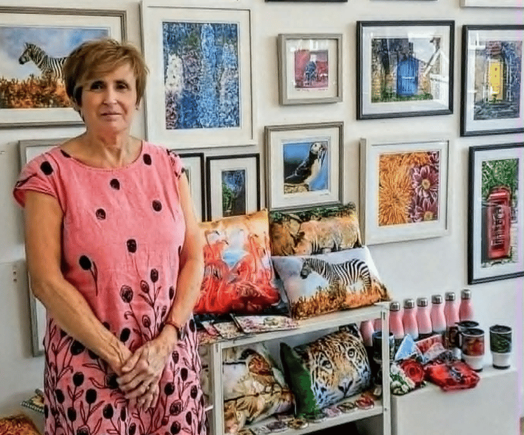 Farnham artist Susie Lidstone with her exhibition at The Corner Gallery in Carshalton, July 2026.