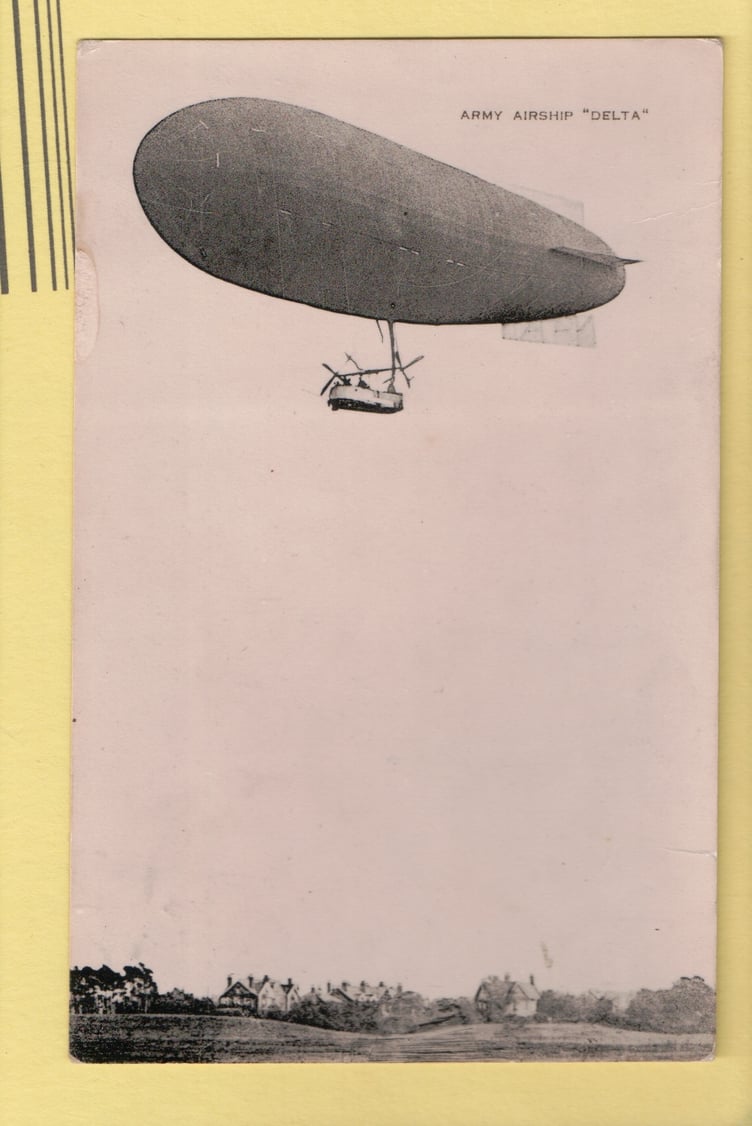 An historic postcard of an airship.