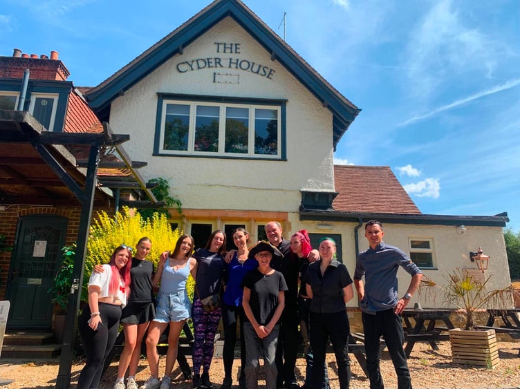 Chelsey and Shaun Hayter with members of The Cyder House Inn team outside the pub, which closed its doors after eight years.