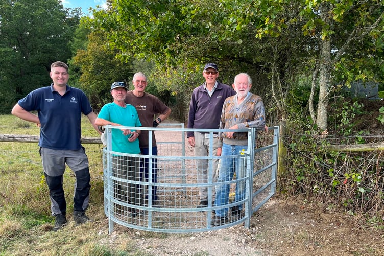 Members of the group's footpath working party proudly display their handiwork, the latest of many kissing gates they have installed in collaboration with SCC