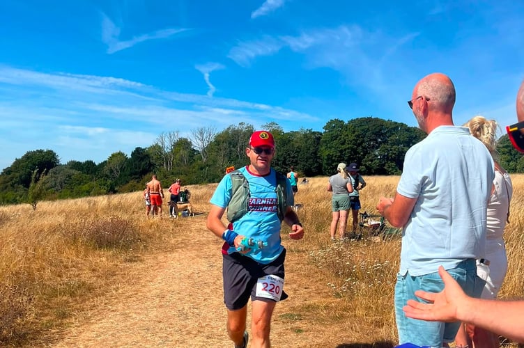 Ivan Chunnett strides on despite the warm conditions