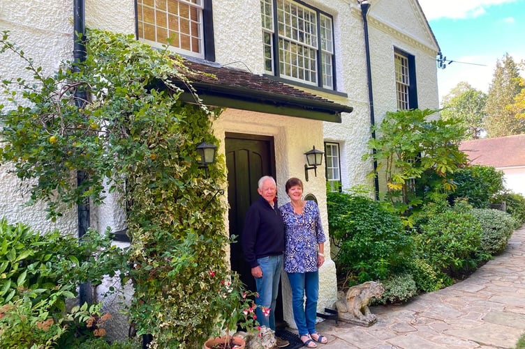 The O'Brien's outside their home in Tilford.