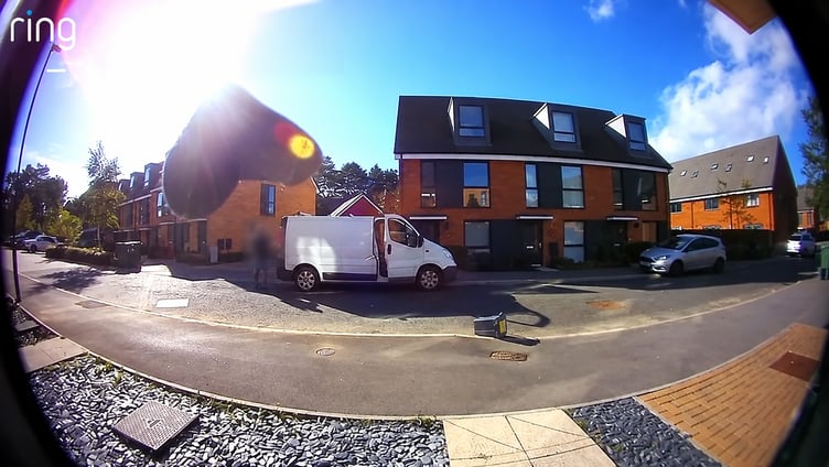 Doorbell camera footage taken in Bordon on October 13, when residents reported problems with missing parcel deliveries. The individual has been obscured.